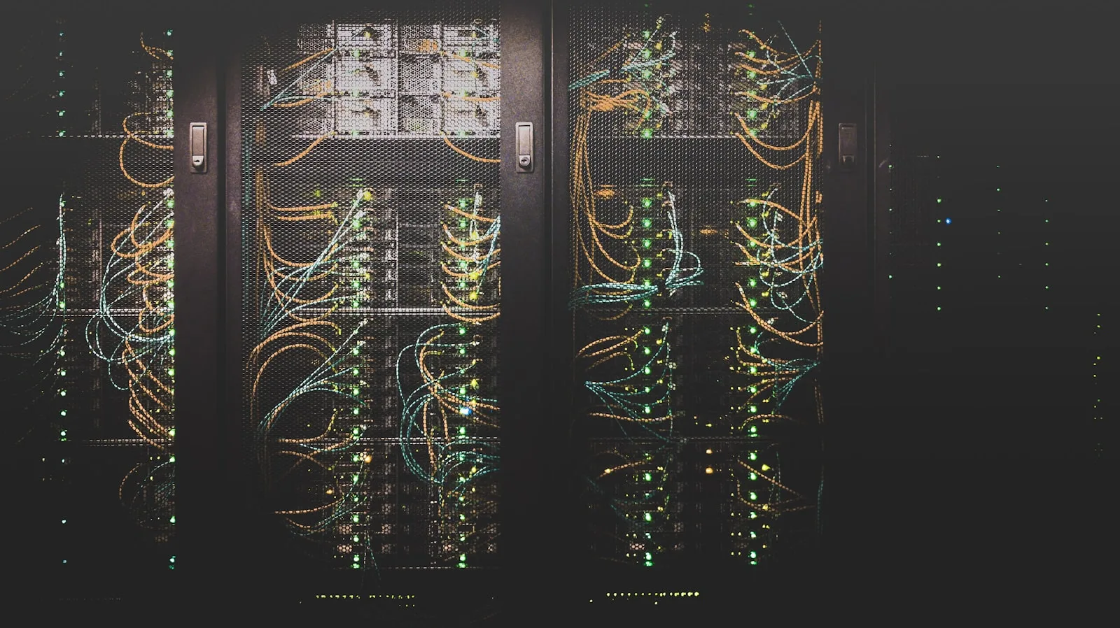 Server racks with glowing blue cables in a data centre