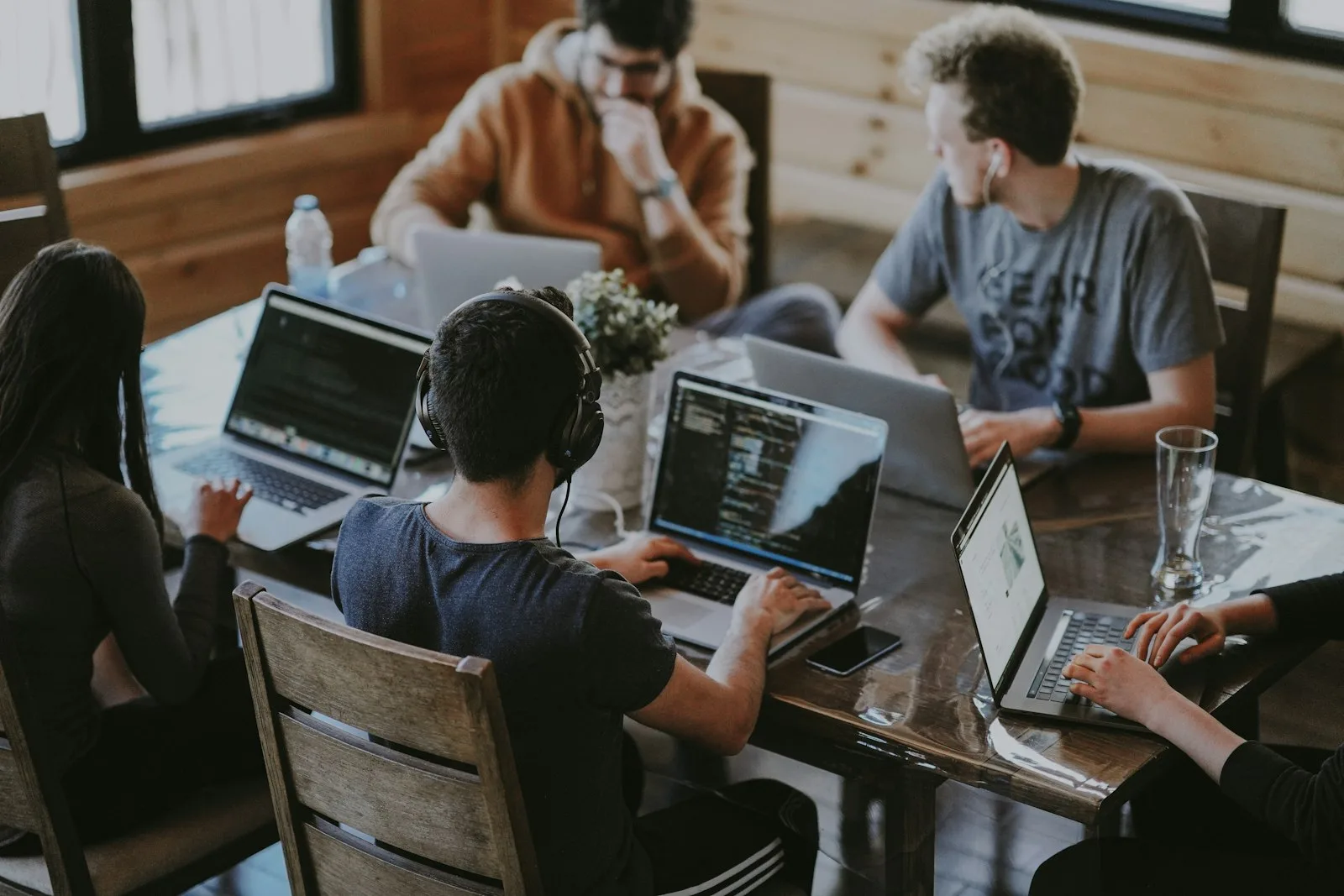 Developers working together on laptops